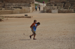 He fell off his chariot in the hippodrome at Caesarea. 