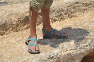 Dusty feet on the threshold of the gate at Lachish.